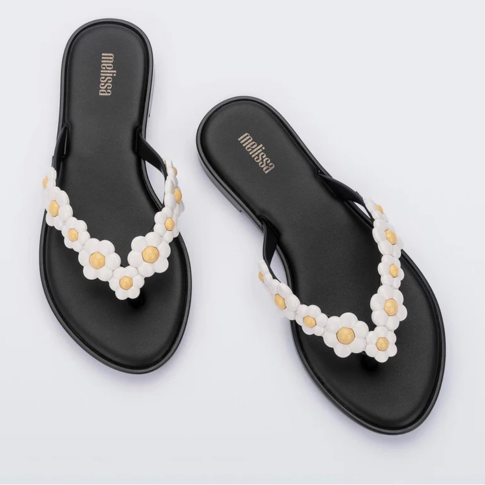 New in box Melissa spring flip flops